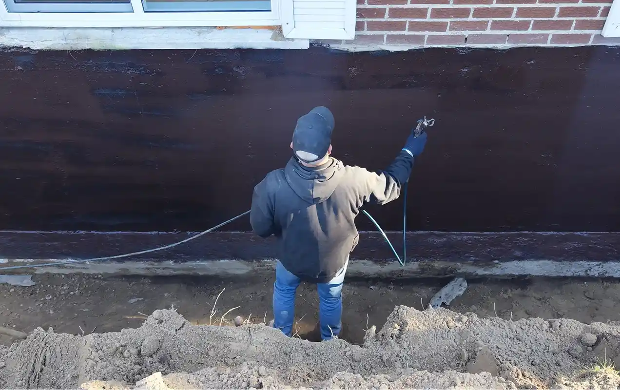 Fondation blocs de béton humidité, fissures et drainage